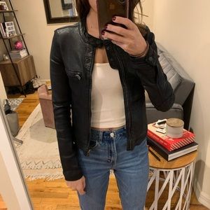 Kiind of wax/coated faux leather jacket